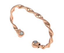 A copper bangle with two healing magnets