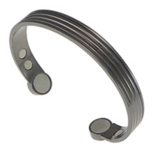 A black coloured copper bangle with six healing magnets