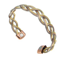 An open-weave copper bangle with two healing magnets