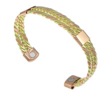 A copper bangle with two healing magnets